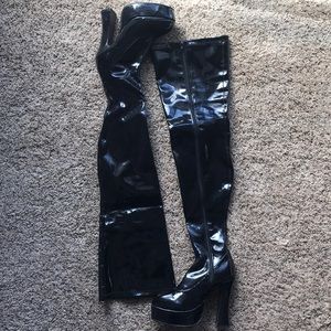 Patent leather thigh high boots